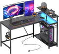 Bestier 52' Gaming Desk with Integrated Power Outlet & USB Ports, L-Shaped Computer Desk with LED Strip & Headphone Hooks, Perfect for Home Office Pink,Carbon Fiber Black